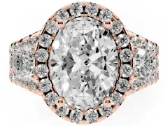 Oval Cut Diamond Halo Split Shank Ring Set in Rose gold with Round Accent Stones and Prong Setting