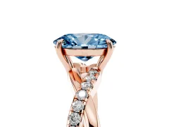 Fancy Blue Oval Cut Diamond Twisted Pavé Band Ring Set in Rose gold with Prong Setting