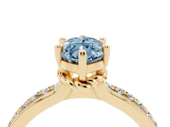 Fancy Blue Marquise Cut Diamond Solitaire Ring Set in Yellow gold with Channel Set Band and Prong Setting