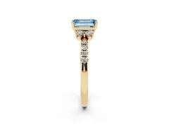 Fancy Blue Emerald Cut Diamond Three-Stone Pavé Ring Set in Yellow gold with Prong Setting