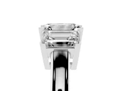 Emerald Cut Diamond Three-Stone Ring Set in Silver with Channel-Set Band and Prong Settings