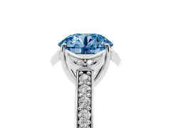 Fancy Blue Round Cut Diamond Halo Ring Set in Platinum with Channel Set Band and Prong Setting