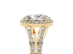 Oval Cut Diamond Halo Split Shank Pavé Ring Set in Yellow gold with Prong Setting