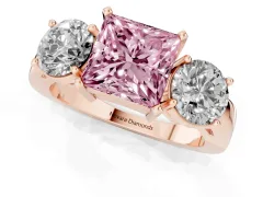 Fancy Pink Princess Cut Diamond Three-Stone Ring Set in Rose gold with Round Side Stones and Classic Band