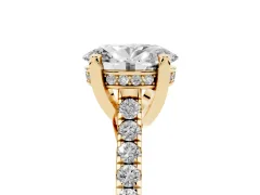 Oval Cut Diamond Solitaire Ring Set in Yellow gold with Brilliant Pavé Band and Prong Setting