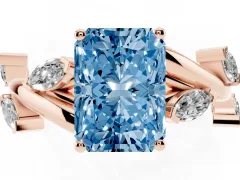 Fancy Blue Radiant Cut Diamond Solitaire Ring Set in Rose gold with Twisted Marquise Accent Band