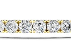 Round Cut Diamond Tennis Bracelet Set in Yellow gold with Four-Prong Setting
