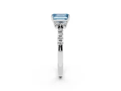 Fancy Blue Emerald Cut Diamond Three-Stone Pavé Ring Set in White gold with Prong Setting
