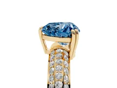 Fancy Blue Heart Cut Diamond Solitaire Ring Set in Yellow gold with Multi-Row Round Pavé Band and Prong Setting