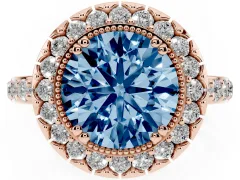 Fancy Blue Round Cut Diamond Halo Ring Set in Rose gold with Pavé Shank and Prong Setting