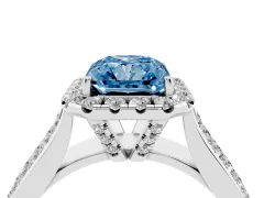 Fancy Blue Radiant Cut Diamond Halo Ring Set in White gold with Pavé Band and Raised Center Setting