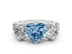 Fancy Blue Heart Cut Diamond Three-Stone Ring Set in White gold with Textured Band