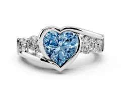 Fancy Blue Heart Cut Diamond Bezel Bypass Ring Set in White gold with Round Accents