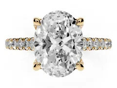 Oval Cut Diamond Solitaire Ring Set in Yellow gold with Brilliant Pavé Band and Prong Setting