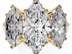 Marquise Cut Diamond Three-Stone Ring Set in Yellow gold with Channel-Set Band and Prong Settings