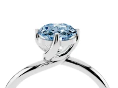 Fancy Blue Oval Cut Diamond Solitaire Engagement Ring Set in White gold with Classic Plain Band