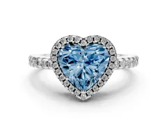 Fancy Blue Heart Cut Diamond Halo Ring Set in Platinum with Pavé Shoulders and Halo-Framed Center