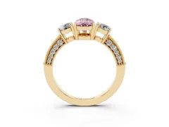 Fancy Pink Pear Cut Diamond Three-Stone Ring Set in Yellow gold with Round Side Stones and Pavé Band