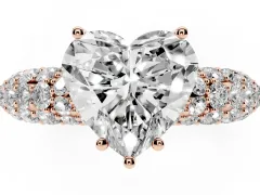 Heart Cut Diamond Pavé Band Solitaire Ring Set in Rose gold with Close-Set Accent Stones and Prong Setting