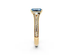 Fancy Blue Emerald Cut Diamond Split Shank Pavé Engagement Ring Set in Yellow gold with Prong-Set Center Stone