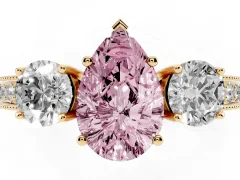 Fancy Pink Pear Cut Diamond Three-Stone Ring Set in Yellow gold with Round Side Stones and Pavé Band