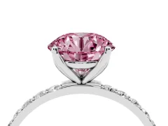 Fancy Pink Round Cut Diamond Solitaire Engagement Ring Set in Platinum with Round Pavé Band and Prong Setting