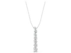 Round Diamond S-Curve Pendant Set in White gold with Graduated Prong Setting