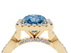 Fancy Blue Radiant Cut Diamond Halo Twist Band Solitaire Ring Set in Yellow gold with Prong Setting