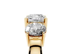 Cushion Cut Diamond Three-Stone Ring Set in Yellow gold with Round Side Stones and Classic Band