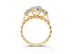 Heart Cut Diamond Three-Stone Ring Set in Yellow gold with Braided Band