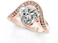 Heart Cut Diamond Solitaire Engagement Ring Set in Rose gold with Pavé Shoulders