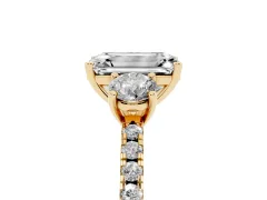 Emerald Cut Diamond Three-Stone Ring Set in Yellow gold with Pavé Band and Graduated Sides