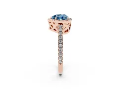 Fancy Blue Heart Cut Diamond Halo Ring Set in Rose gold with Pavé Shoulders and Halo-Framed Center