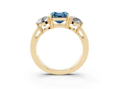 Fancy Blue Asscher Cut Diamond Three-Stone Ring Set in Yellow gold with Round Side Stones and Classic Band