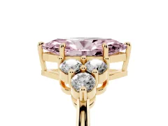 Fancy Pink Marquise Cut Diamond Solitaire Ring Set in Yellow gold with Cluster Accents on Each Side
