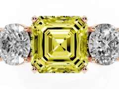 Fancy Yellow Asscher Cut Diamond Three-Stone Ring Set in Rose gold with Round Side Stones and Classic Band