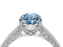 Fancy Blue Oval Cut Diamond Solitaire Ring Set in Silver with Milgrain-Edged Pavé Band and Prong Setting