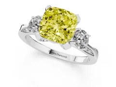 Fancy Yellow Cushion Cut Diamond Three-Stone Ring Set in White gold with Pavé Band and Smaller Side Stones