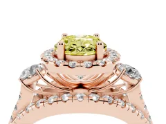Fancy Yellow Oval Cut Diamond Halo Split Shank Ring Set in Rose gold with Round Accent Stones and Prong Setting