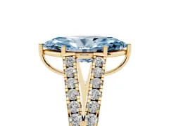 Fancy Blue Marquise Cut Diamond Split Shank Pavé Engagement Ring Set in Yellow gold with Prong-Held Center Stone
