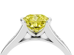 Fancy Yellow Cushion Cut Diamond Bezel-Set Solitaire Ring Set in Platinum with Channel-Set Band