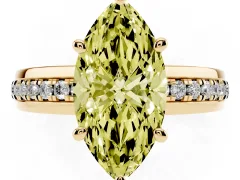 Fancy Yellow Marquise Cut Diamond Solitaire Ring Set in Yellow gold with Channel Set Band and Prong Setting