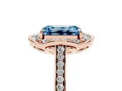 Fancy Blue Emerald Cut Diamond Halo Ring Set in Rose gold with Pavé-Lined Shoulders and Prong Setting