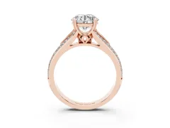 Round Cut Diamond Split Shank Pavé Engagement Ring Set in Rose gold with Prong-Set Center Stone