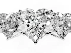 Heart Cut Diamond Three-Stone Ring Set in White gold with Textured Band