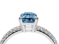 Fancy Blue Emerald Cut Diamond Solitaire Ring Set in Platinum with Multi-Row Round Pavé Band and Prong Setting