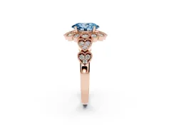 Fancy Blue Oval Cut Diamond Solitaire Ring Set in Rose gold with Milgrain Pavé Heart Band