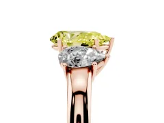 Fancy Yellow Pear Cut Diamond Three-Stone Ring Set in Rose gold with Bold Center and Classic Band