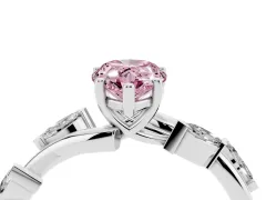 Fancy Pink Pear Cut Diamond Solitaire Ring Set in Platinum with Twisted Marquise Accent Band