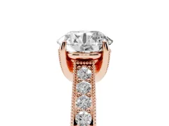 Round Cut Diamond Solitaire Ring Set in Rose gold with Milgrain-Edged Pavé Band and Prong Setting